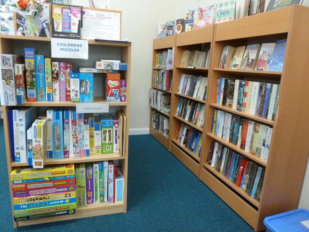 Bookcases and jigsaws in the ClayTAWC reception area
